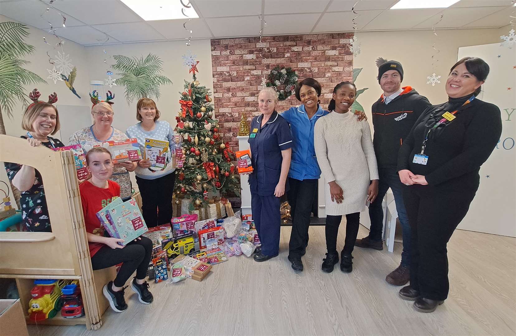 Staff at the William Harvey Hospital in Ashford receive donations from kmfm's Give A Gift Appeal