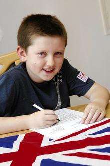 Reuben Fielding, aged 10, had a letter from Buckingham Palace after he wrote to invite the Queen to the street party