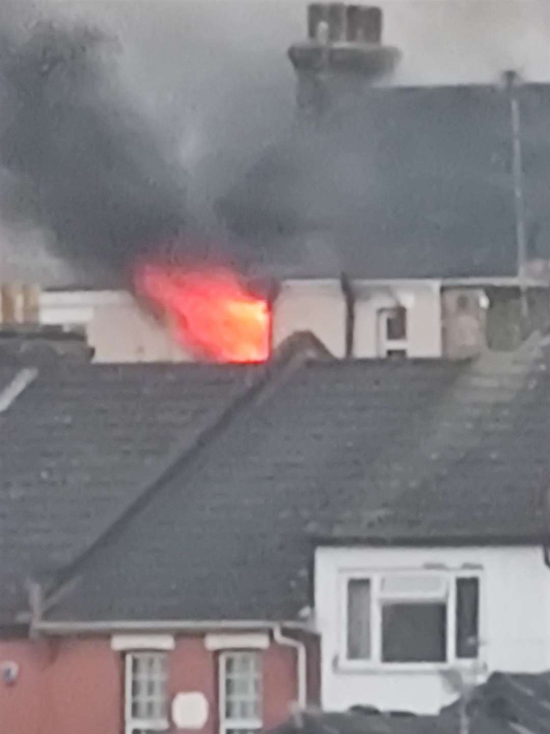 Flames were seen coming out the back window. Picture: Kelvin O'Leary