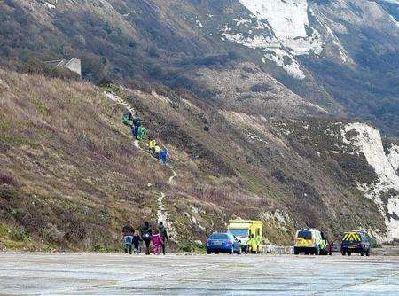 Paramedics rescue a woman who fell on the cliff at the Warren, Folkestone. Picture: Max Hess