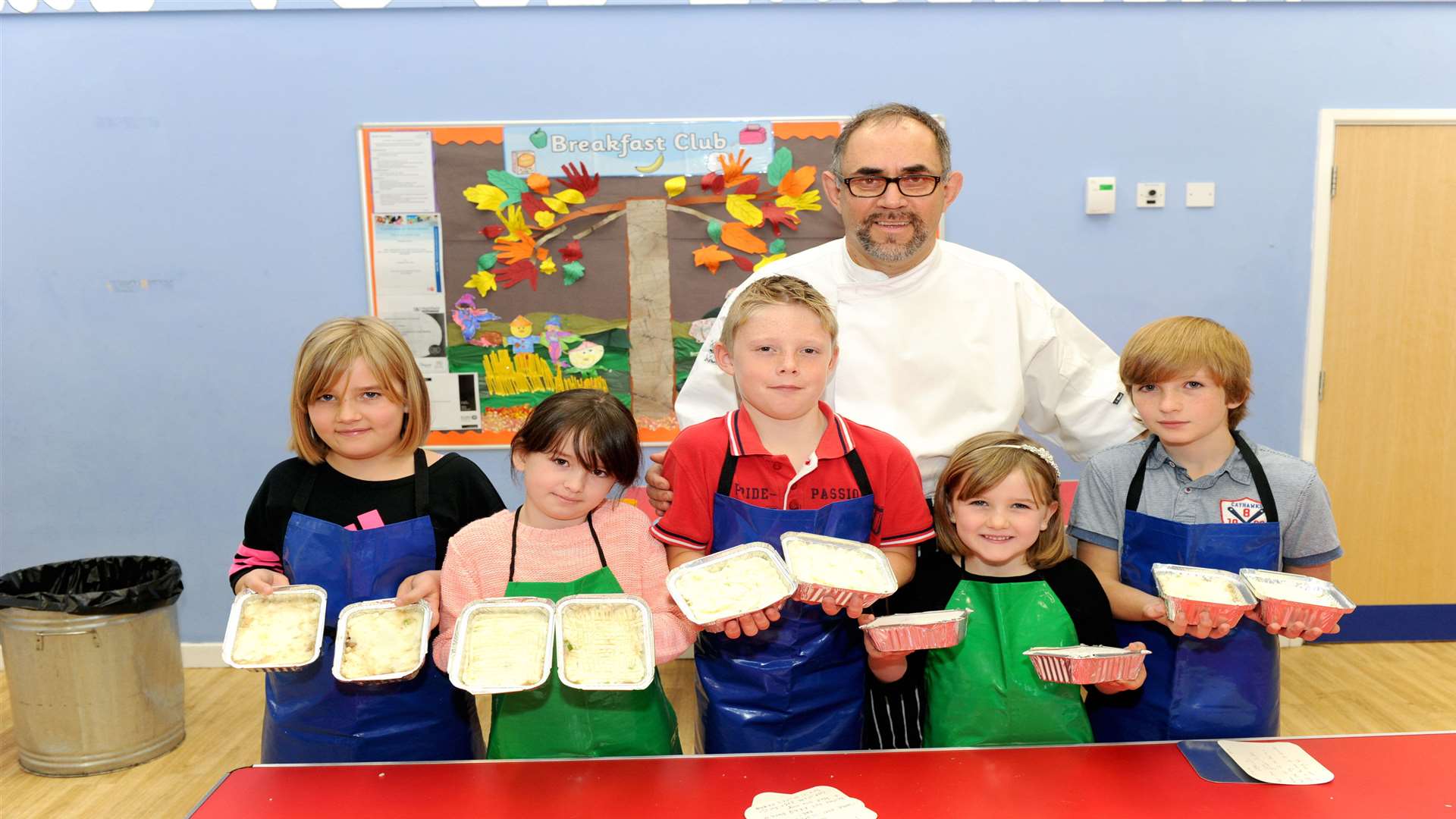 Community chef, Mike Spackman, with students taking part in the cookery masterclass at St Edwards primary.