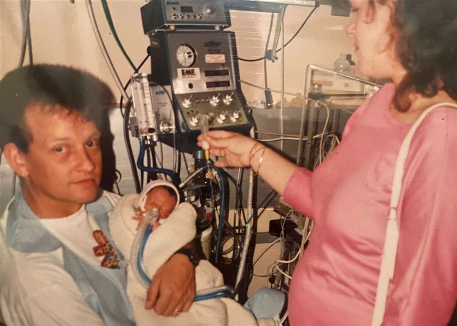 Alexa in the Oliver Fisher Special Care Baby Unit in 1990 with her mum and dad Julian and Kim Campbell. Picture: Alexa Goodger
