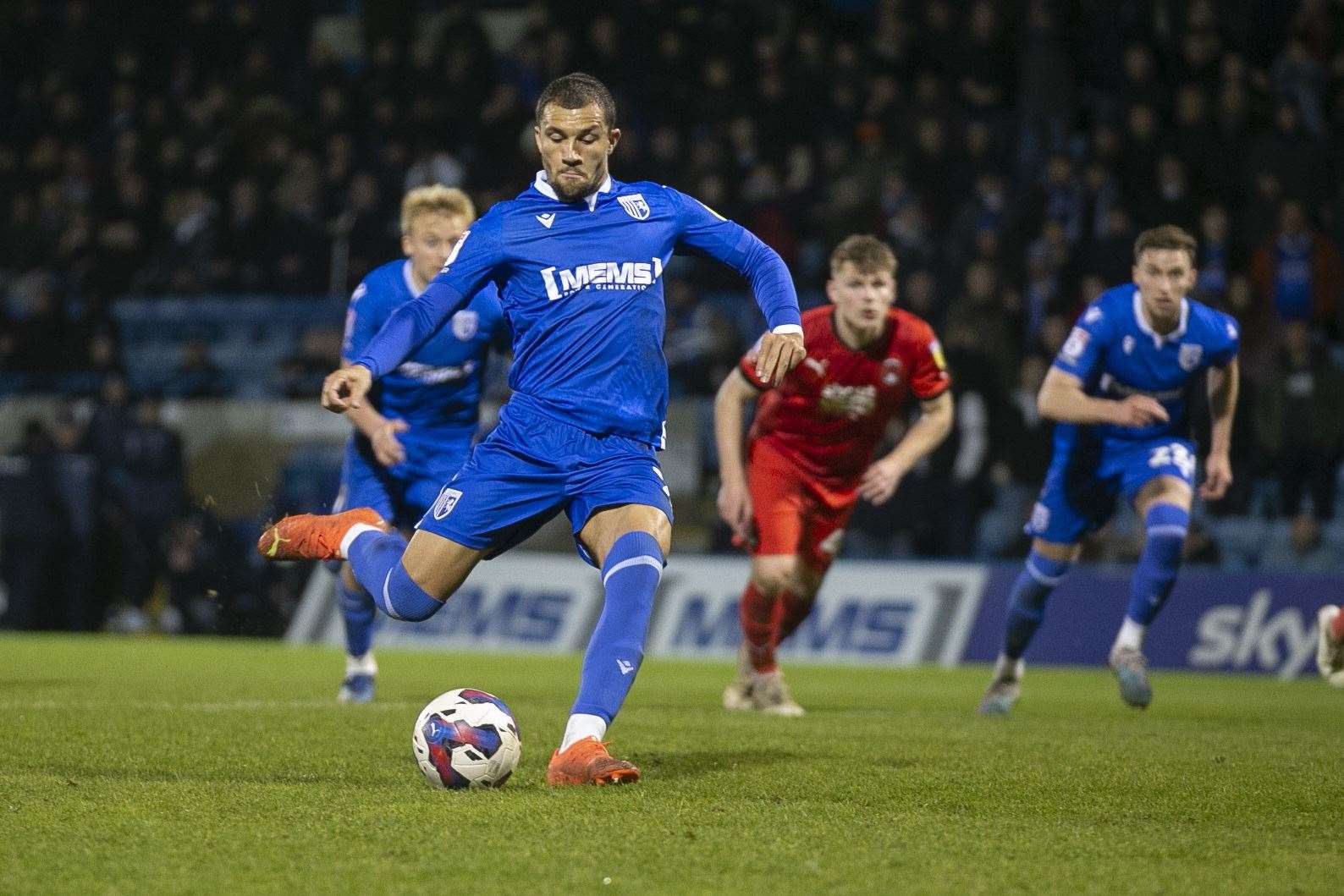 Cheye Alexander scores the second goal from the penalty spot for Gillingham