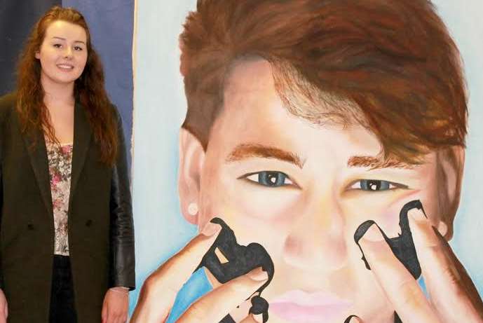 Talented Hannah Zimmer with her portrait of Fraser Bullock.