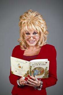 Dolly Parton is encouraging Sheppey children to develop a love of books