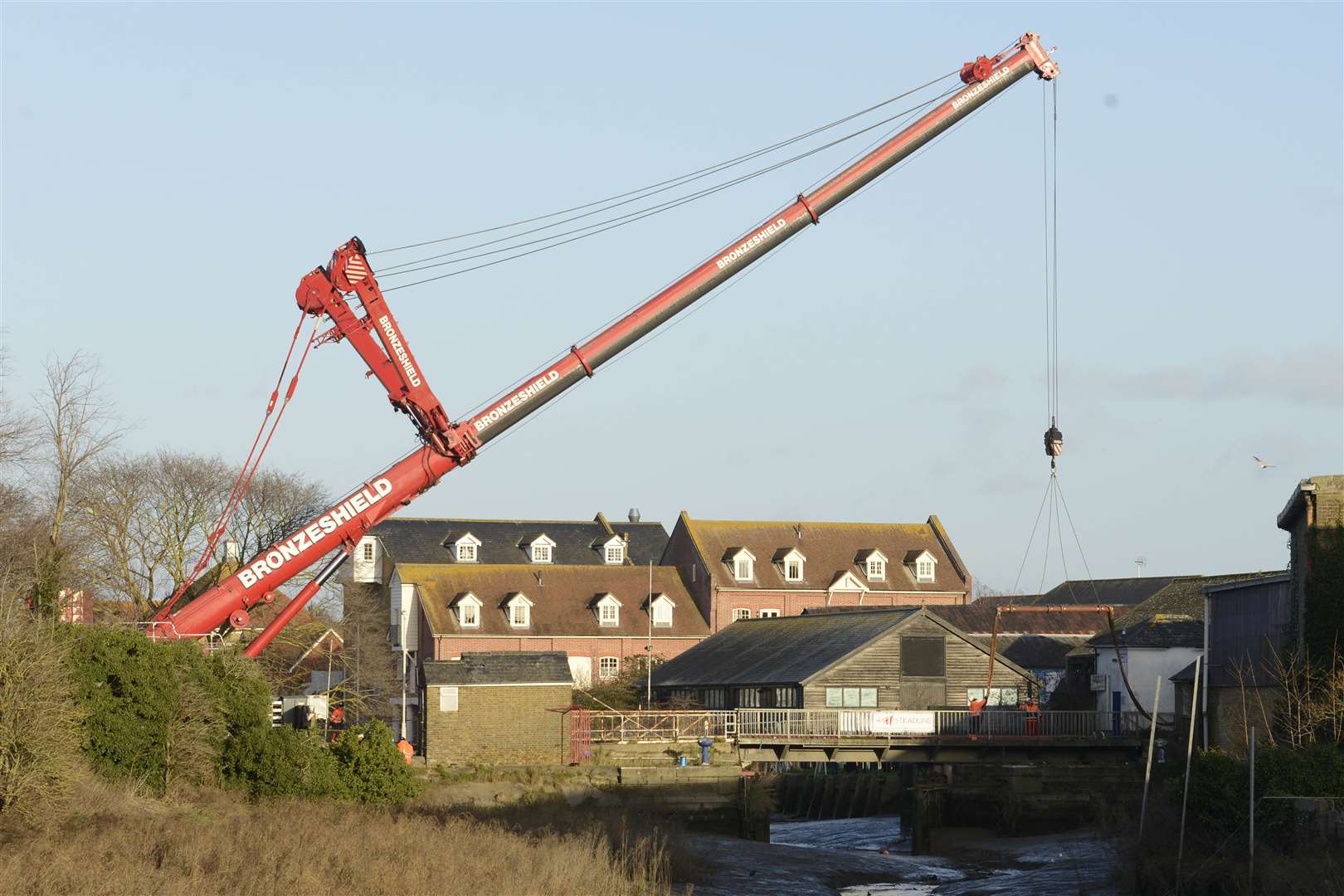 Contractors were forced to bring in another crane to lift the bridge. Picture: Paul Amos