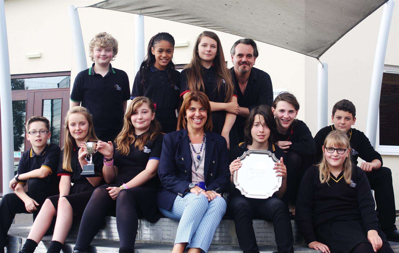 Sandwich Technology School students celebrate win at Kent Film Festival with teacher Adrian Smith and head teacher Veronica Gomez