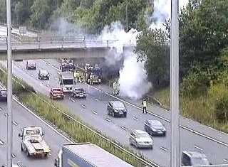 The car's bonnet was alight this afternoon. Picture: Highways England