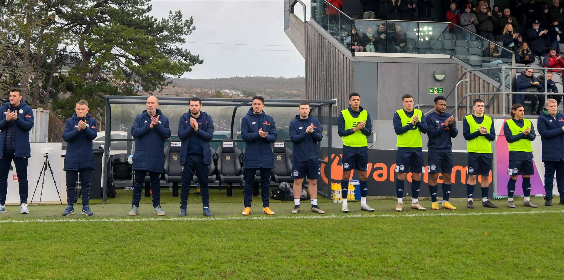 Dover's dug-out take part in a minute's applause in memory of Pele. Picture: Stuart Brock