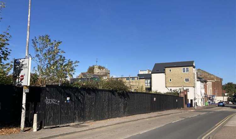 Hoardings in Bell Road, Sittingbourne, hide what is going on, or not, on the site of the former Bell shopping centre. Picture: John Nurden
