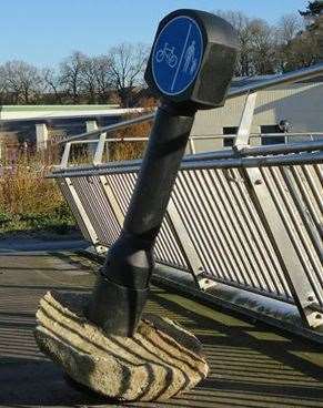 Thugs tried to drop a bollard from a bridge over the M20