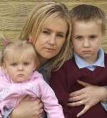 VICTIM: Tracy Card with her son Tommy and baby Liberty. Picture: GRANT FALVEY