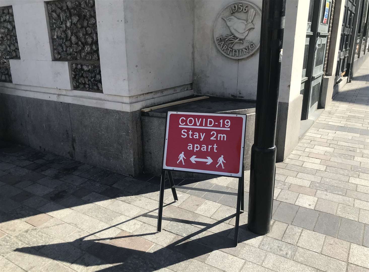 Signs advise shoppers returning to Maidstone town centre to follow social distancing practices in a bid to limit spread of coronavirus