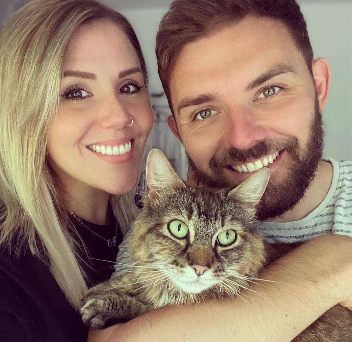 Alice and Alex Harris have been reunited with their wandering cat