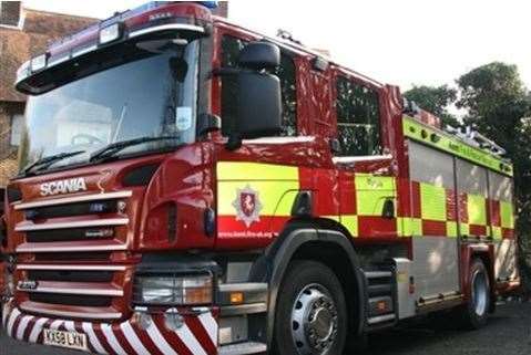 Firefighters were called by a neighbour who spotted the roof fire