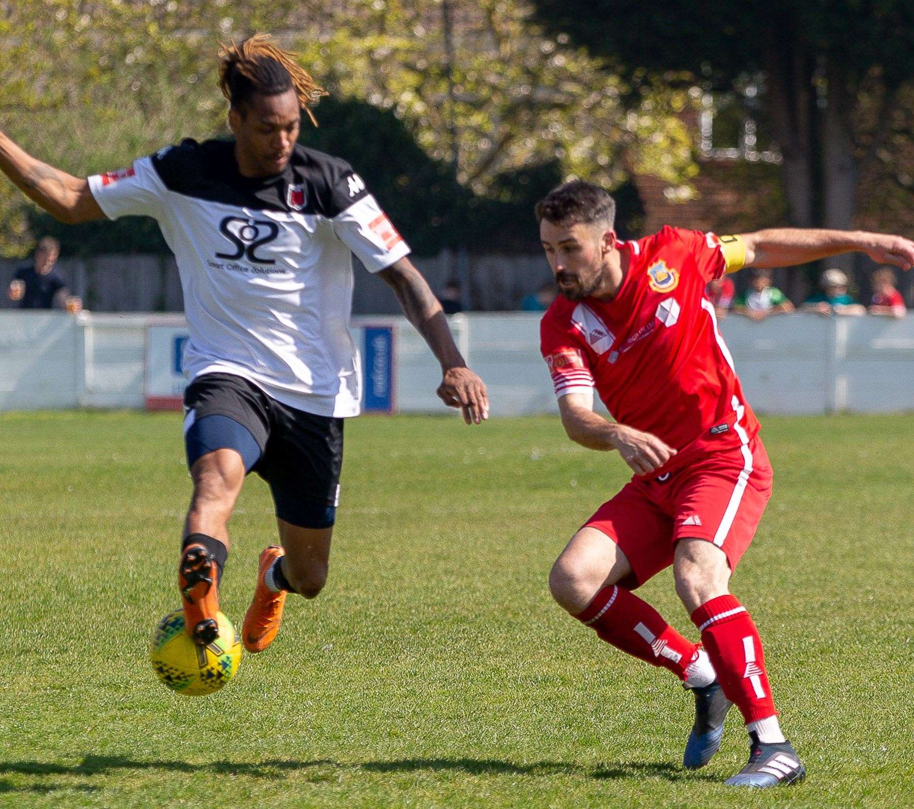 Whitstable's Tom Mills cuts behind Tyrell Richardson-Brown as Faversham beat Whitstable 1-0 last Saturday. Picture: Les Biggs
