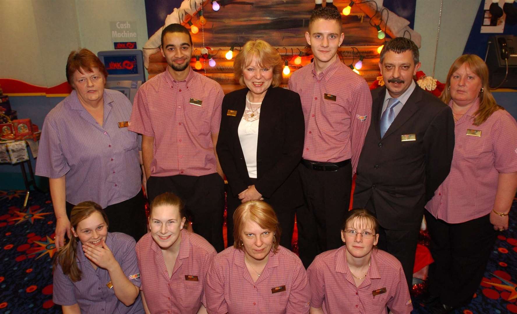 Bingo caller Elaine Henshaw-Smith with Mecca Bingo staff in December 2005. Picture: Danny Rhodes