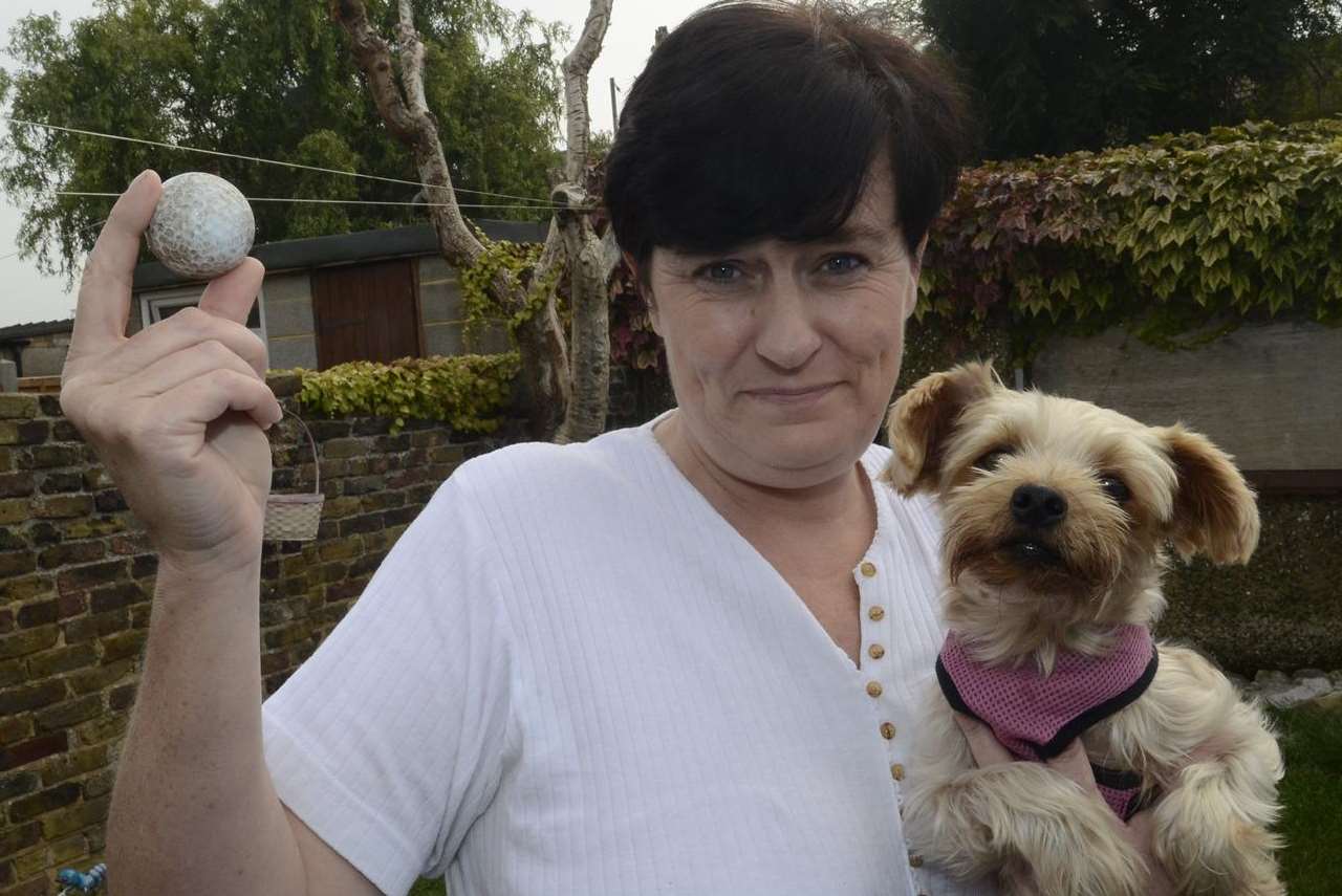 Lynda Denman and her dog Daisy who was injured by a golf ball