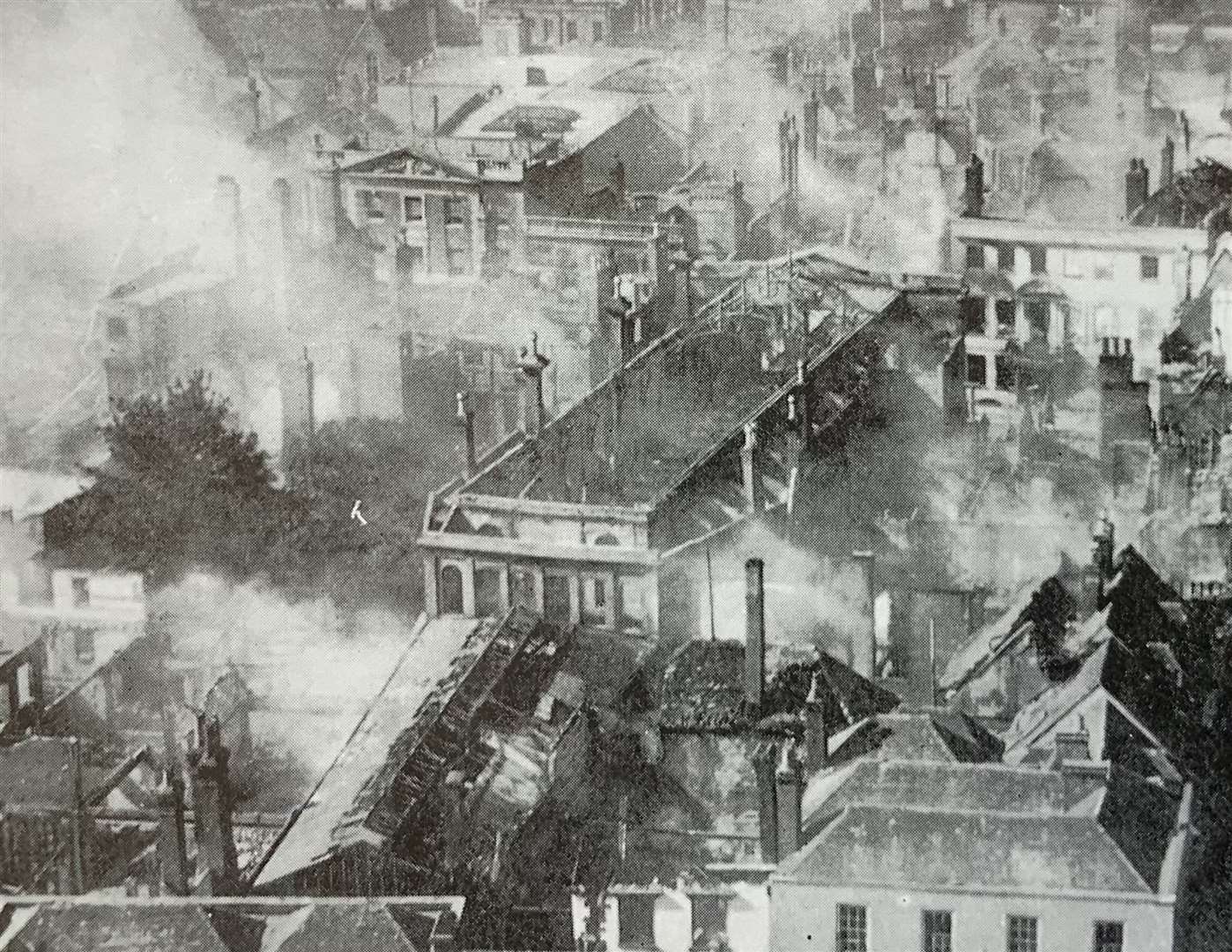 The scene of destruction after the bombing raid of June 1, 1942, when most of St George's Street was destroyed. The classical front of Marks & Spencer can be seen in the centre of the picture, which shows other parts of the city smouldering. Picture: Neil Mattingly