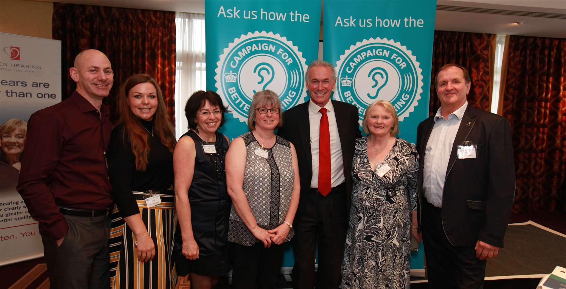 Dr Hilary Jones greets some worthy recipients of free hearing aids awarded by the Campaign for Better Hearing at the recent event in Maidstone.