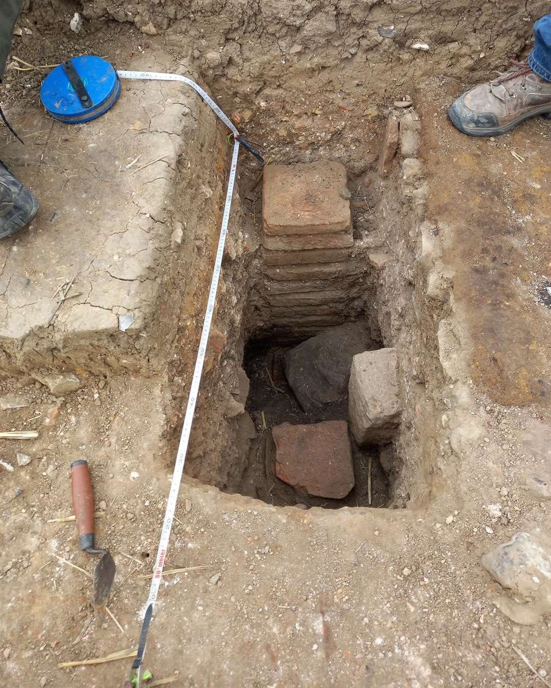 An excavated pillar - known as a pilae stack - part of the underfloor heating system beneath the villa's nearby bathhouse. Image: Kent Archaeological Society