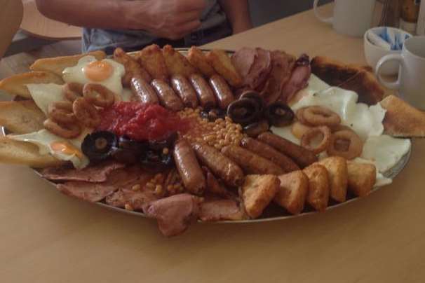 Ollie Williams, a customer of Papa Joe's Cafe in St Michael's with the 10Terden Terminator mega fry-up.
