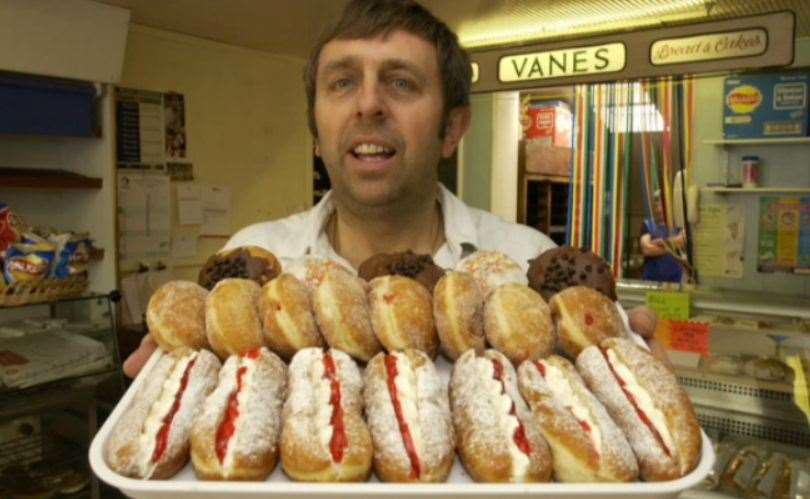 Jeff Vane with fresh doughnuts ready for a charity week at the shop in April 2005