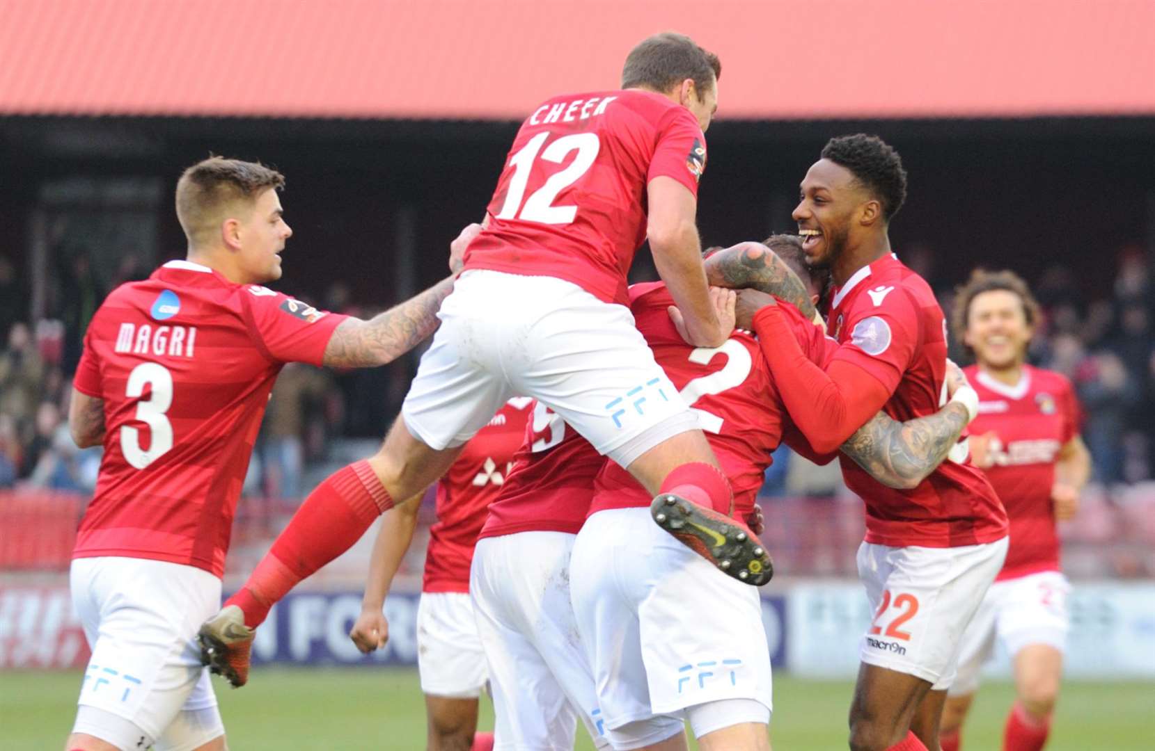 Jack King (2) is mobbed after scoring against Leyton Orient Picture: Simon Hildrew