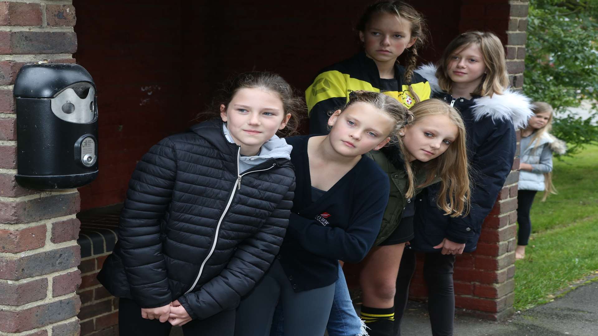 Erin, Bethan, Lauren, Sadye and Daisy, all 11 at The Wateringbury Hotel Bus stop where they were stranded last week when the school bus did not turn up.
