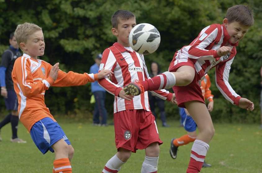 Cuxton 91 under-9s, in orange, take on Strood United Red under-9s. Picture: Andy Payton