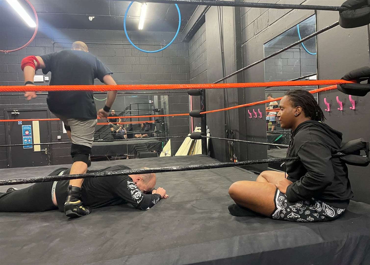 Ayshea watches on as Boo and one of the trainees practice