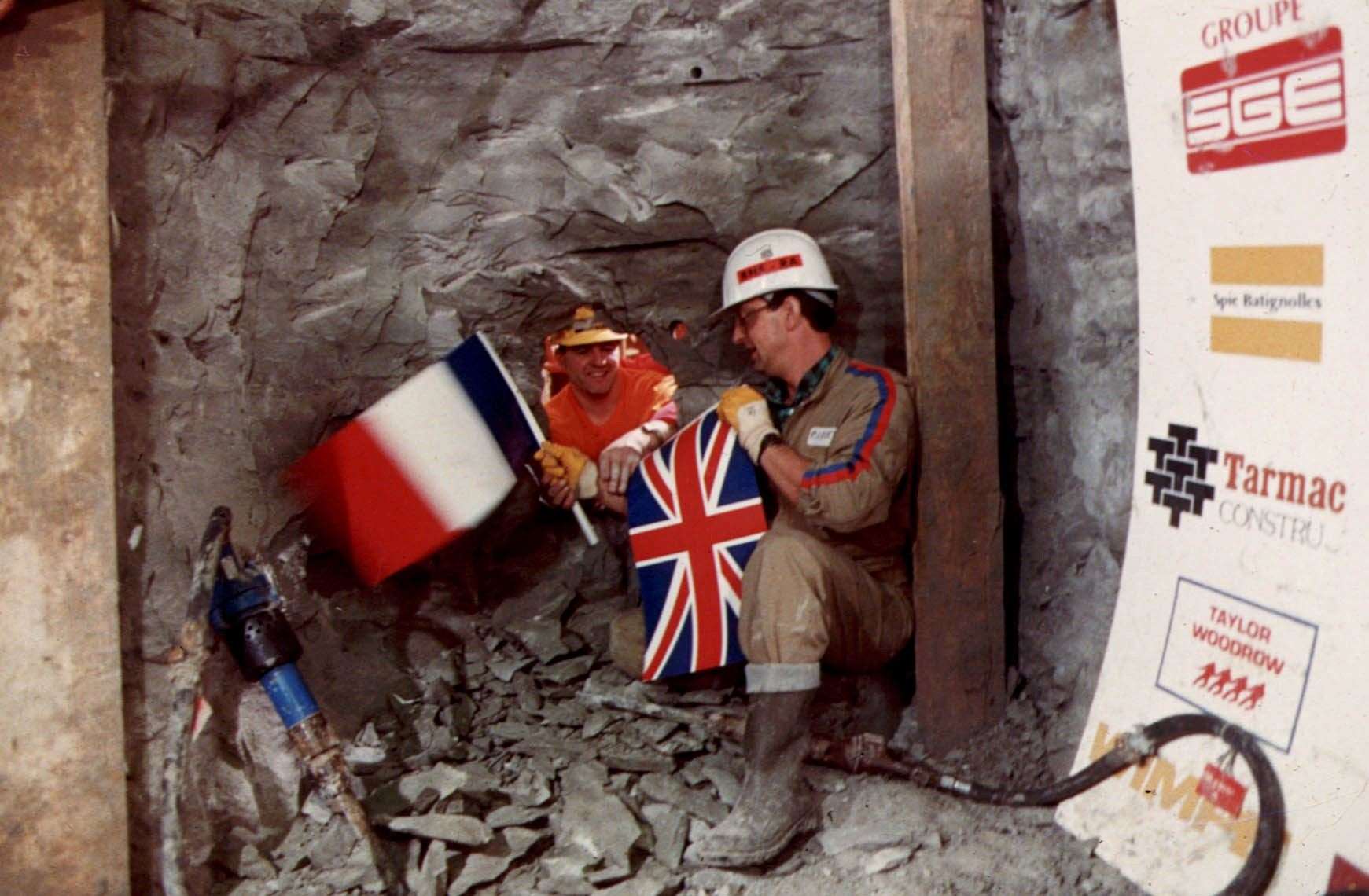 English Channel Tunnel worker Graham Fagg meets French counterpart Philippe Cozette when the two ends of the tunnel finally met in December 1990