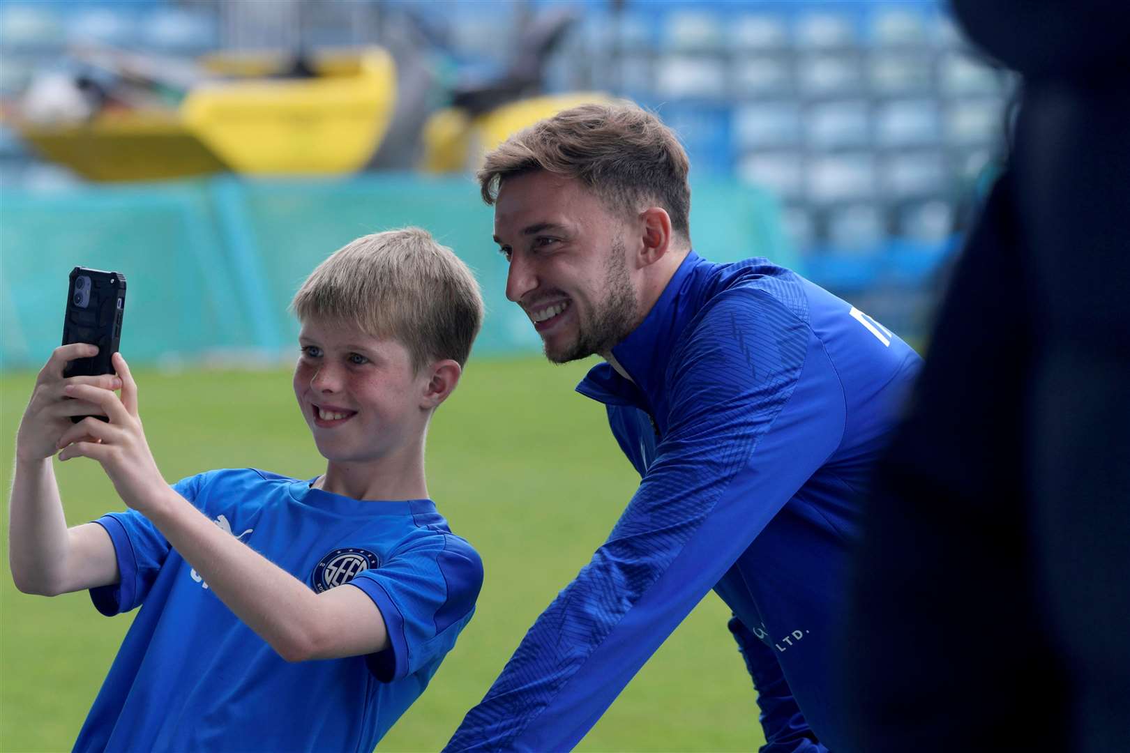 Conor Masterson with a fan at Priestfield Picture: Barry Goodwin