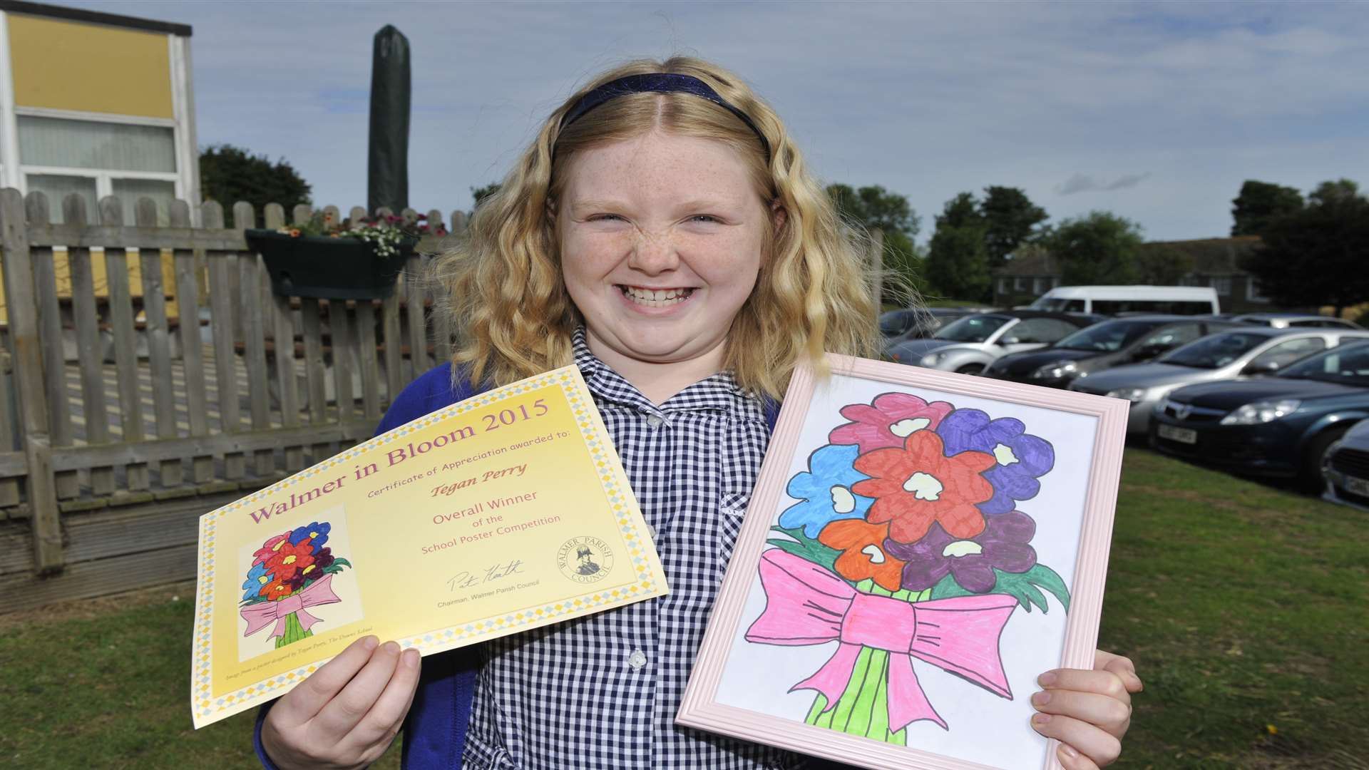 Winners of school poster competition. Winner nine year old Tegan Perry