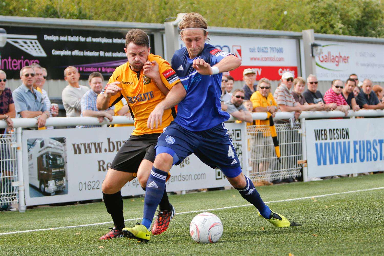 Earlier action in the game between Stones' Frannie Collin and Will Salmon