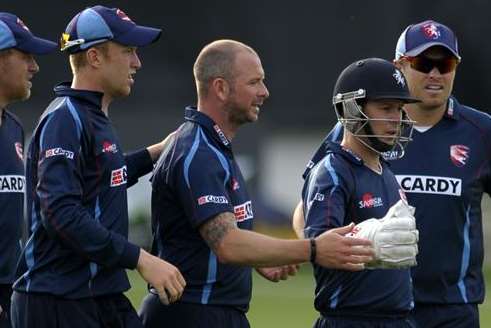 Kent players celebrate taking a wicket against Sussex