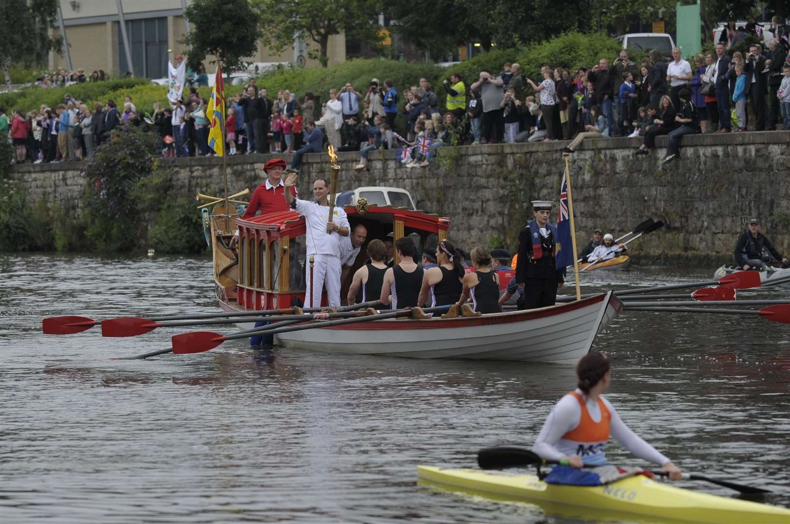 David Boyle from Tonbridge with the torch on the River Medway at Maidstone