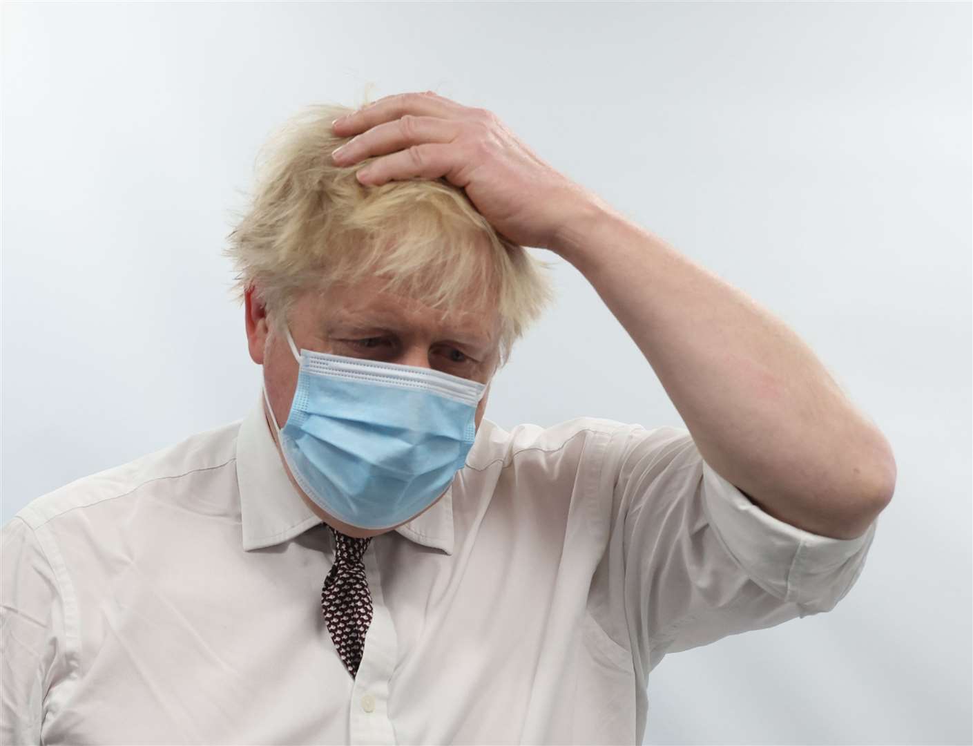 Prime Minister Boris Johnson talks to staff during a visit to the Finchley Memorial Hospital (Ian Vogler/PA)