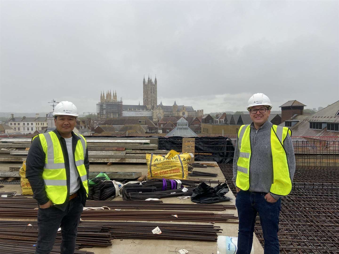 Directors of the hotel development, Zaw Htut and Mike Wood, standing atop the hotel where the restaurant will operate