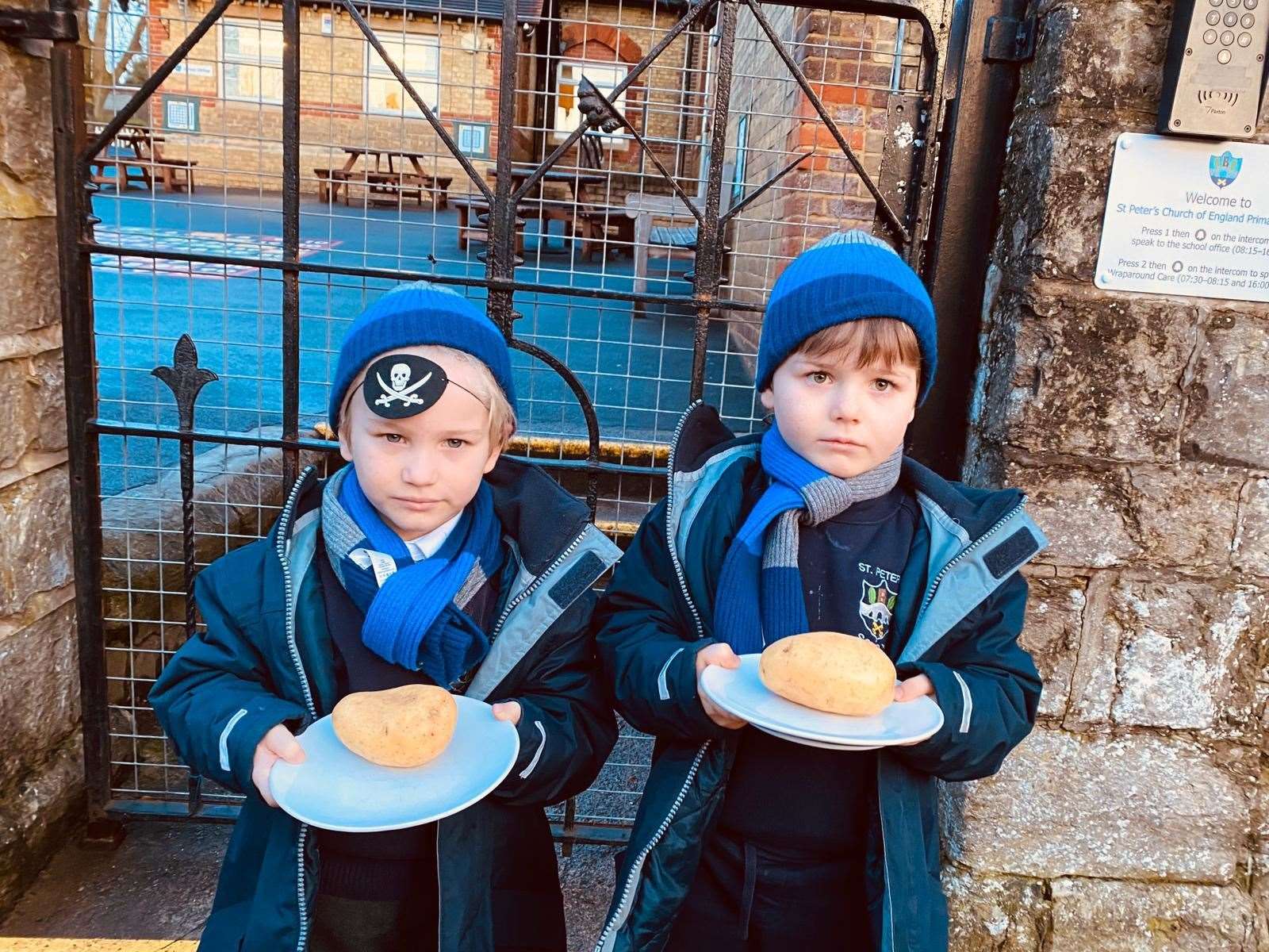 Alvin, 4, and Victor Jakel, 5, are served jacket potatoes every day at St Peter's School, Aylesford