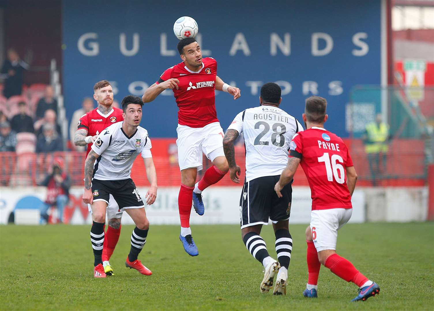 Chris Bush up for a header against Wrexham Picture: Andy Jones