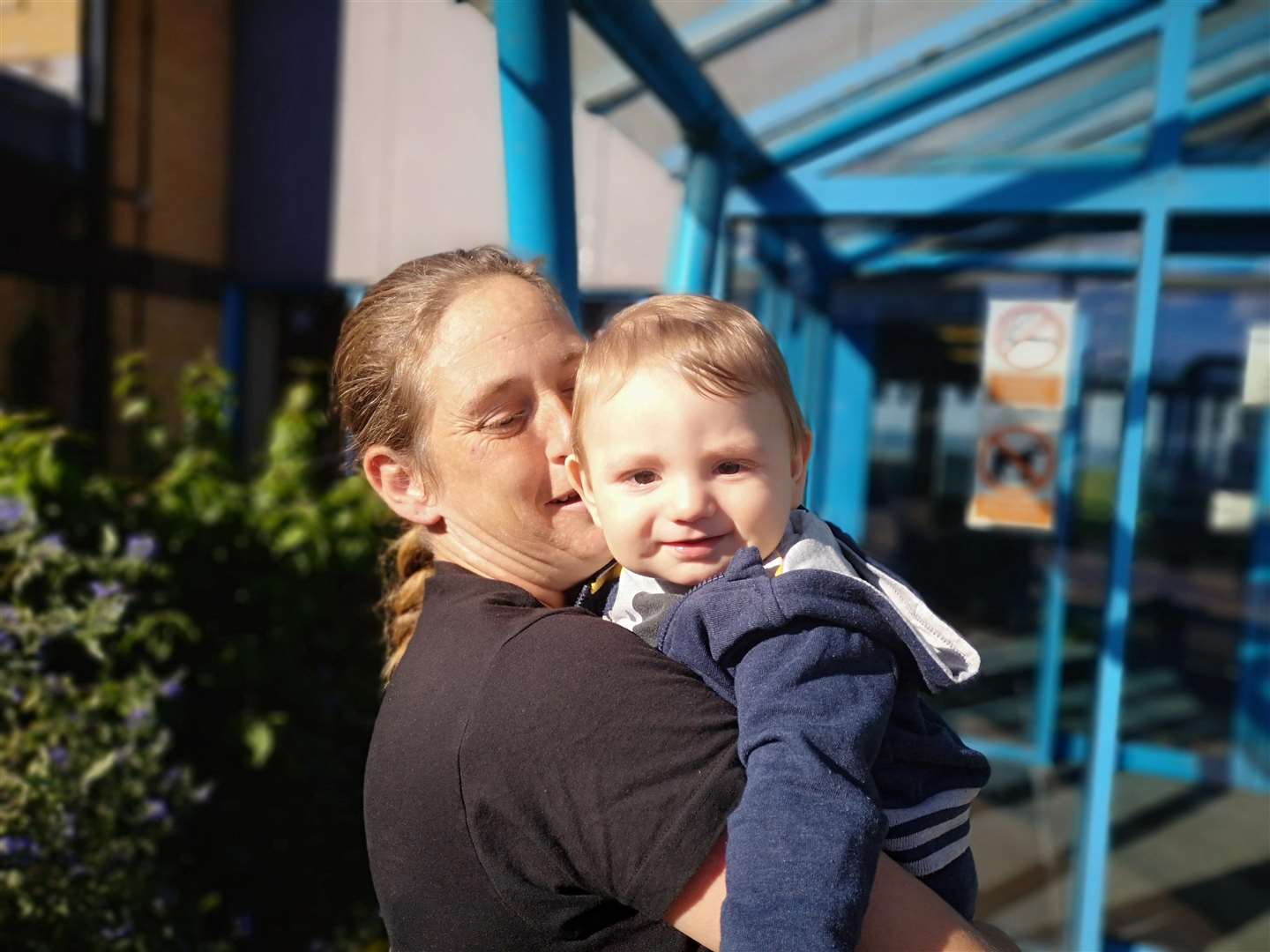 Louise with baby Sammy outside Bethesda Medical Centre (4368399)