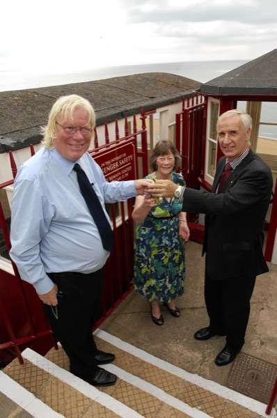 Eamonn Rooney, front left, receives the keys to the Leas Lift