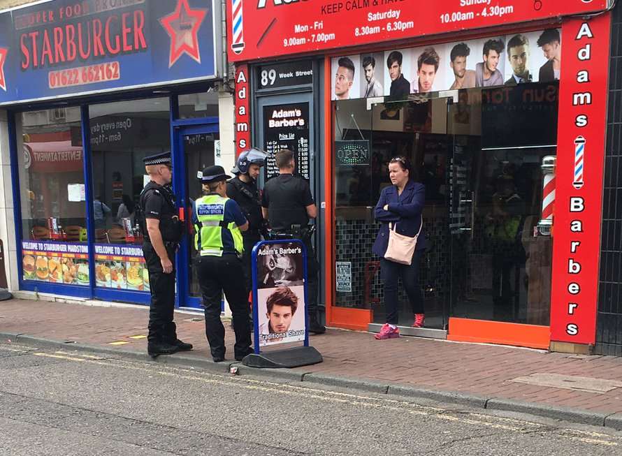Police outside the barbers
