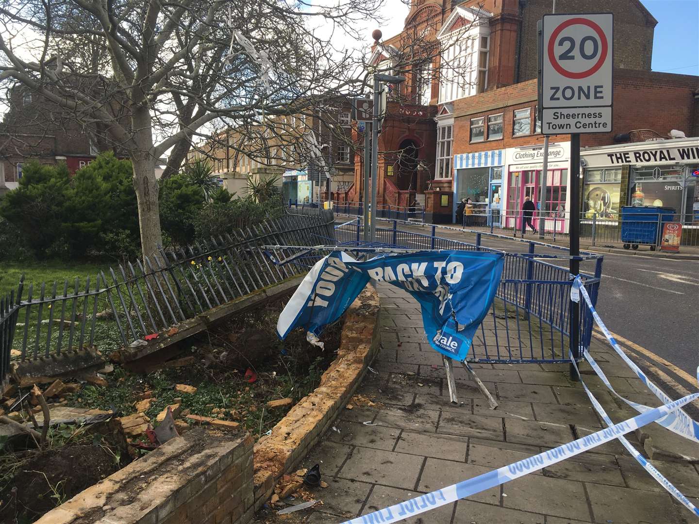 Part of the wall and railings surrounding Holy Trinity Church was demolished when a car crashed at the junction of Sheerness Broadway and Trinity Road on Wednesday night