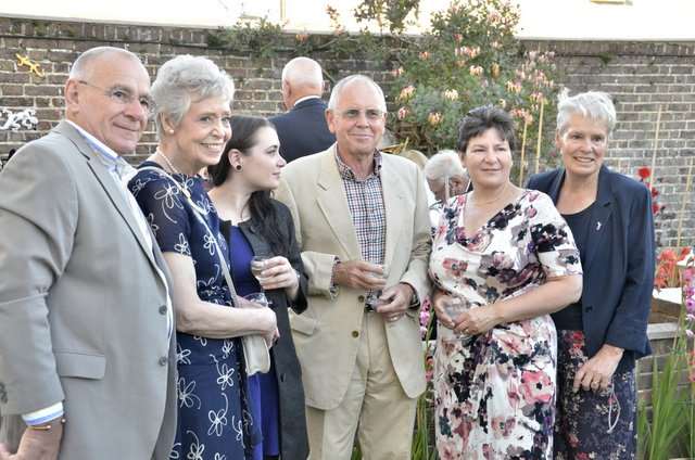 Members of Sir Vician Dunn's family with the present residents of the house, Paul and Sue Le Chevalier