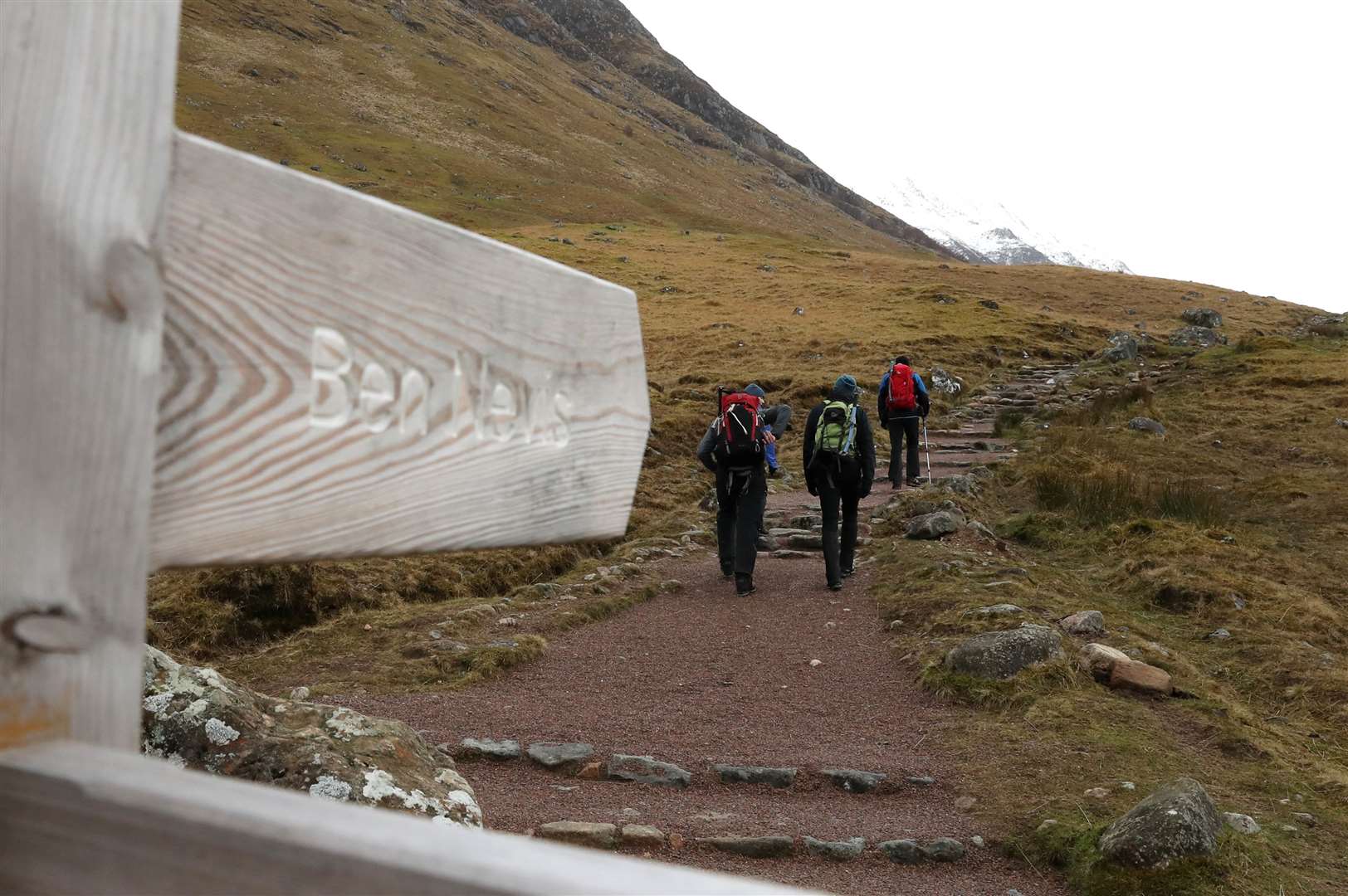 Hill walkers make their way along the Ben Nevis mountain path in Scotland (Andrew Milligan/PA Wire)