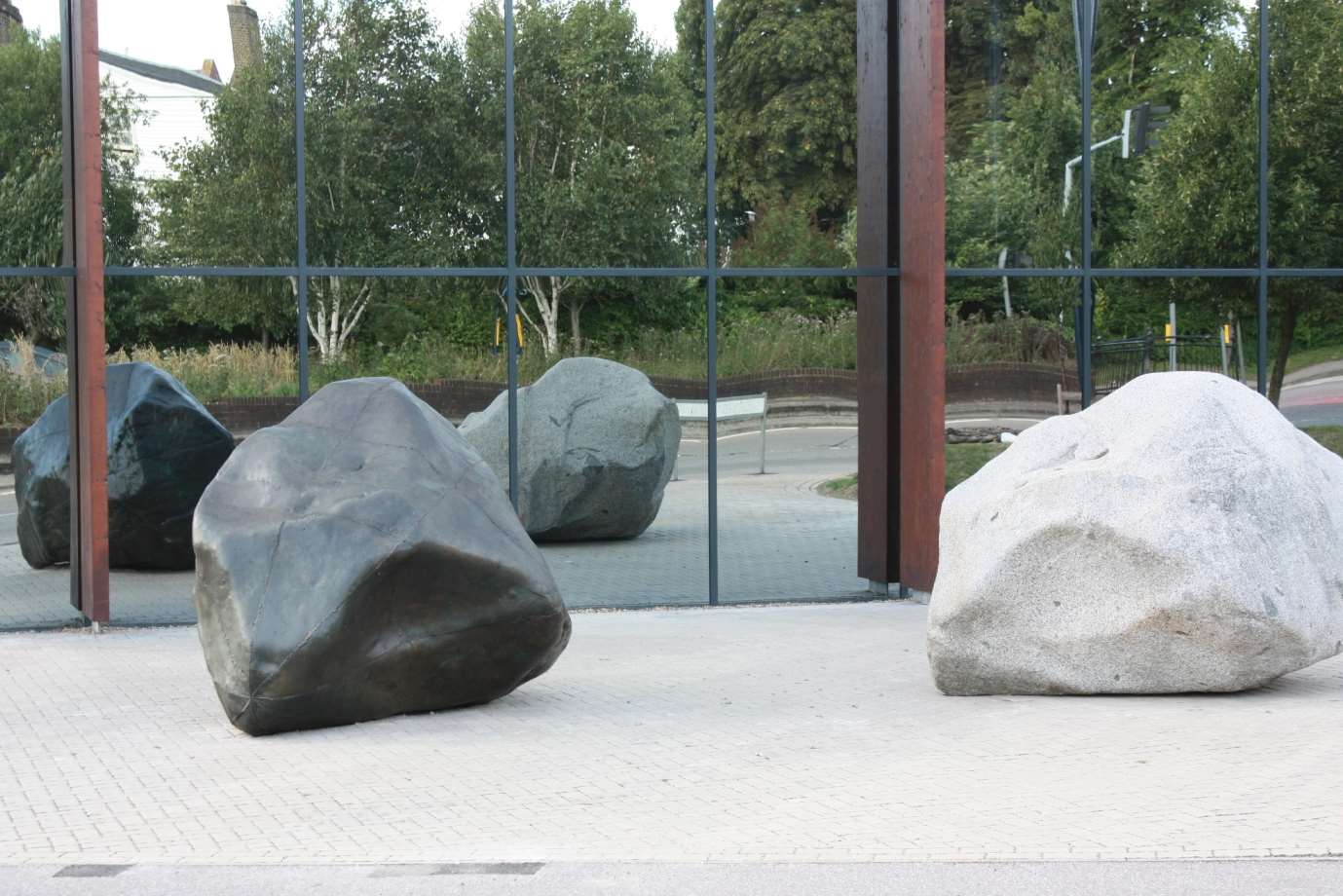 Antony Gormley boulders in their new home outside the Kent History and Library Centre in Maidstone