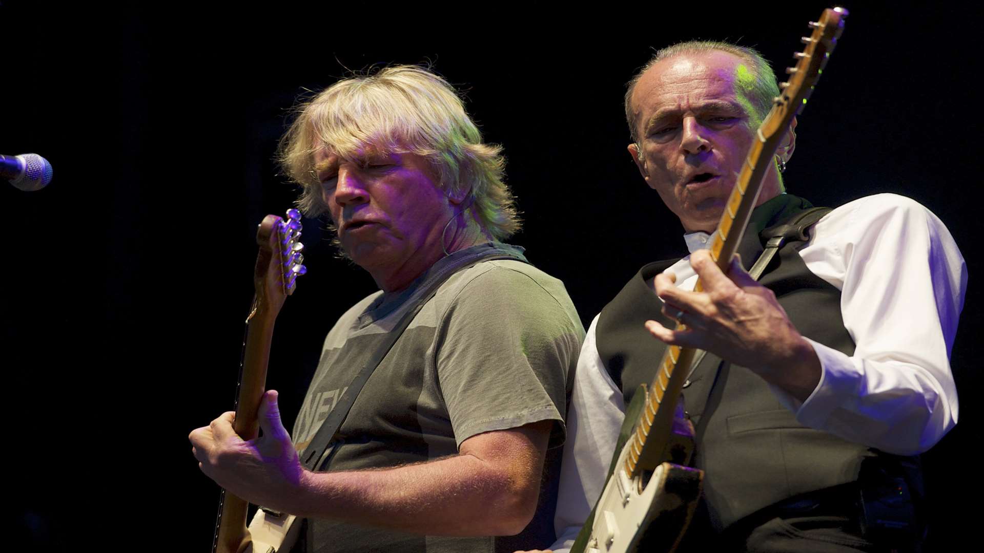 Rick Parfitt, left, and Francis Rossi. Status Quo play the first night at the Rochester Castle Concerts 2013
