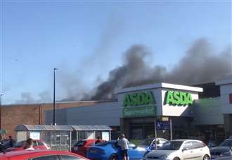 Explosions heard as fire hits shopping centre